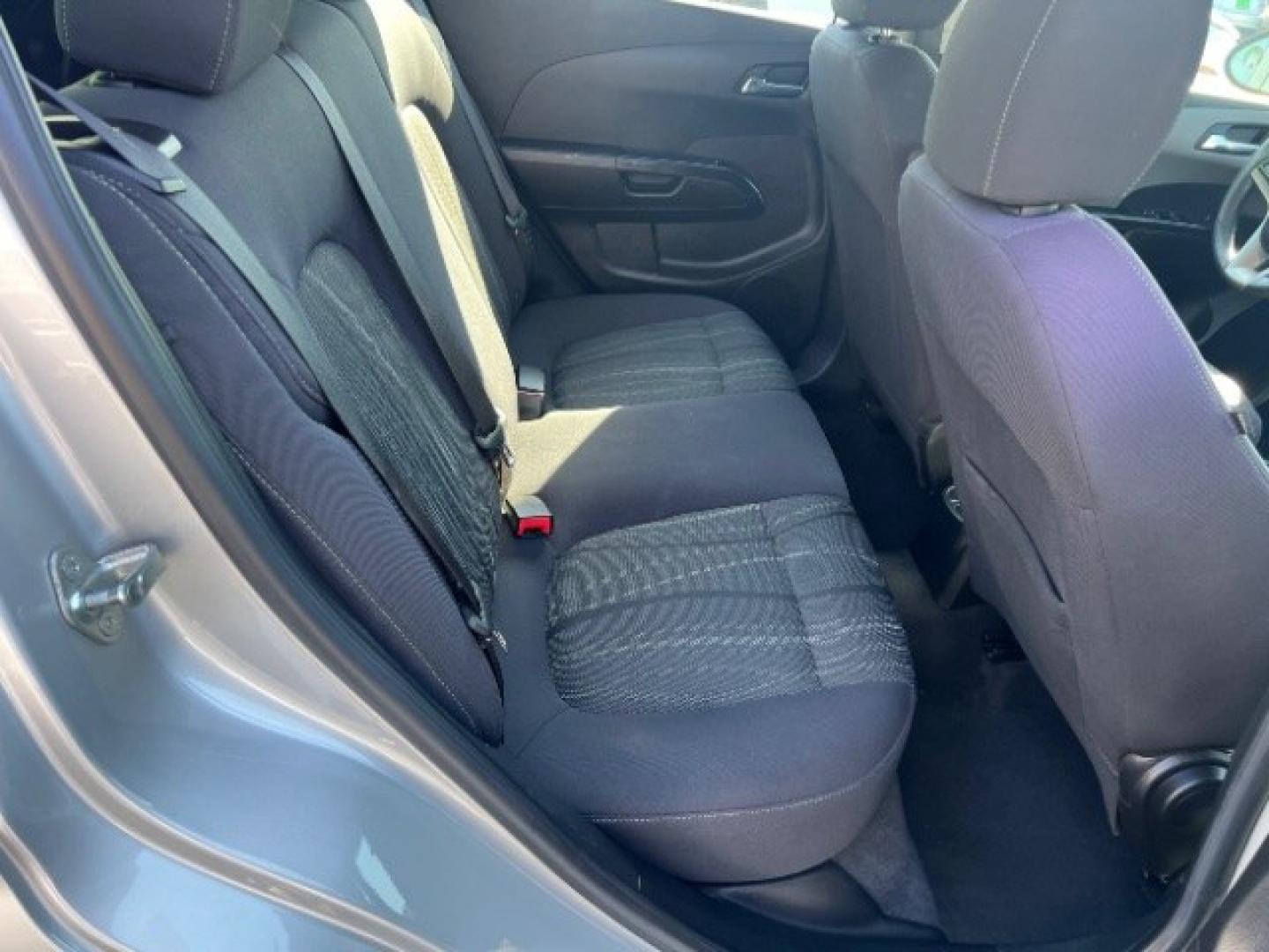 2013 Silver Ice Metallic /Dark Pewter/Dark Titanium Cloth Interior Chevrolet Sonic LT Auto 5-Door (1G1JC6SG9D4) with an 1.8L L4 DOHC 24V engine, 6-Speed Automatic transmission, located at 940 North Main Street, Cedar City, UT, 84720, (435) 628-0023, 37.692936, -113.061897 - We specialize in helping ALL people get the best financing available. No matter your credit score, good, bad or none we can get you an amazing rate. Had a bankruptcy, divorce, or repossessions? We give you the green light to get your credit back on the road. Low down and affordable payments that fit- Photo#24