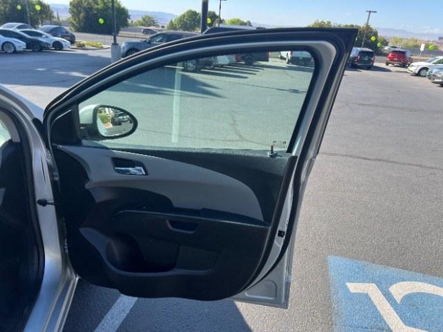 2013 Silver Ice Metallic /Dark Pewter/Dark Titanium Cloth Interior Chevrolet Sonic LT Auto 5-Door (1G1JC6SG9D4) with an 1.8L L4 DOHC 24V engine, 6-Speed Automatic transmission, located at 940 North Main Street, Cedar City, UT, 84720, (435) 628-0023, 37.692936, -113.061897 - We specialize in helping ALL people get the best financing available. No matter your credit score, good, bad or none we can get you an amazing rate. Had a bankruptcy, divorce, or repossessions? We give you the green light to get your credit back on the road. Low down and affordable payments that fit- Photo#25