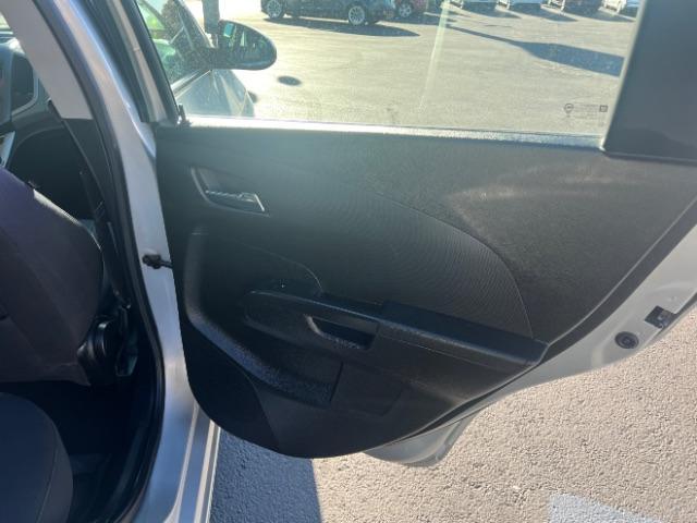 2013 Silver Ice Metallic /Dark Pewter/Dark Titanium Cloth Interior Chevrolet Sonic LT Auto 5-Door (1G1JC6SG9D4) with an 1.8L L4 DOHC 24V engine, 6-Speed Automatic transmission, located at 1865 East Red Hills Pkwy, St. George, 84770, (435) 628-0023, 37.120850, -113.543640 - We specialize in helping ALL people get the best financing available. No matter your credit score, good, bad or none we can get you an amazing rate. Had a bankruptcy, divorce, or repossessions? We give you the green light to get your credit back on the road. Low down and affordable payments that fit - Photo#25
