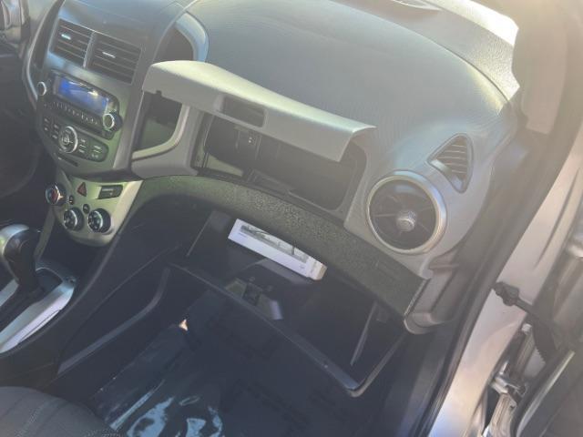 2013 Silver Ice Metallic /Dark Pewter/Dark Titanium Cloth Interior Chevrolet Sonic LT Auto 5-Door (1G1JC6SG9D4) with an 1.8L L4 DOHC 24V engine, 6-Speed Automatic transmission, located at 1865 East Red Hills Pkwy, St. George, 84770, (435) 628-0023, 37.120850, -113.543640 - We specialize in helping ALL people get the best financing available. No matter your credit score, good, bad or none we can get you an amazing rate. Had a bankruptcy, divorce, or repossessions? We give you the green light to get your credit back on the road. Low down and affordable payments that fit - Photo#29