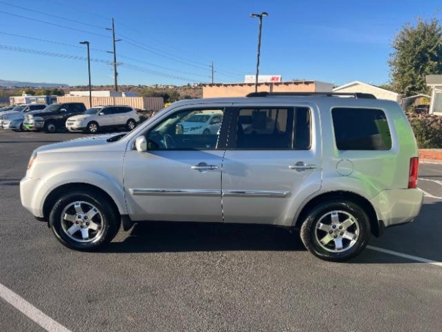 2011 Alabaster Silver Metallic /Black Leather Interior Honda Pilot Touring 4WD 5-Spd AT with DVD (5FNYF4H98BB) with an 3.5L V6 SOHC 24V engine, 5-Speed Automatic transmission, located at 940 North Main Street, Cedar City, UT, 84720, (435) 628-0023, 37.692936, -113.061897 - Photo#3