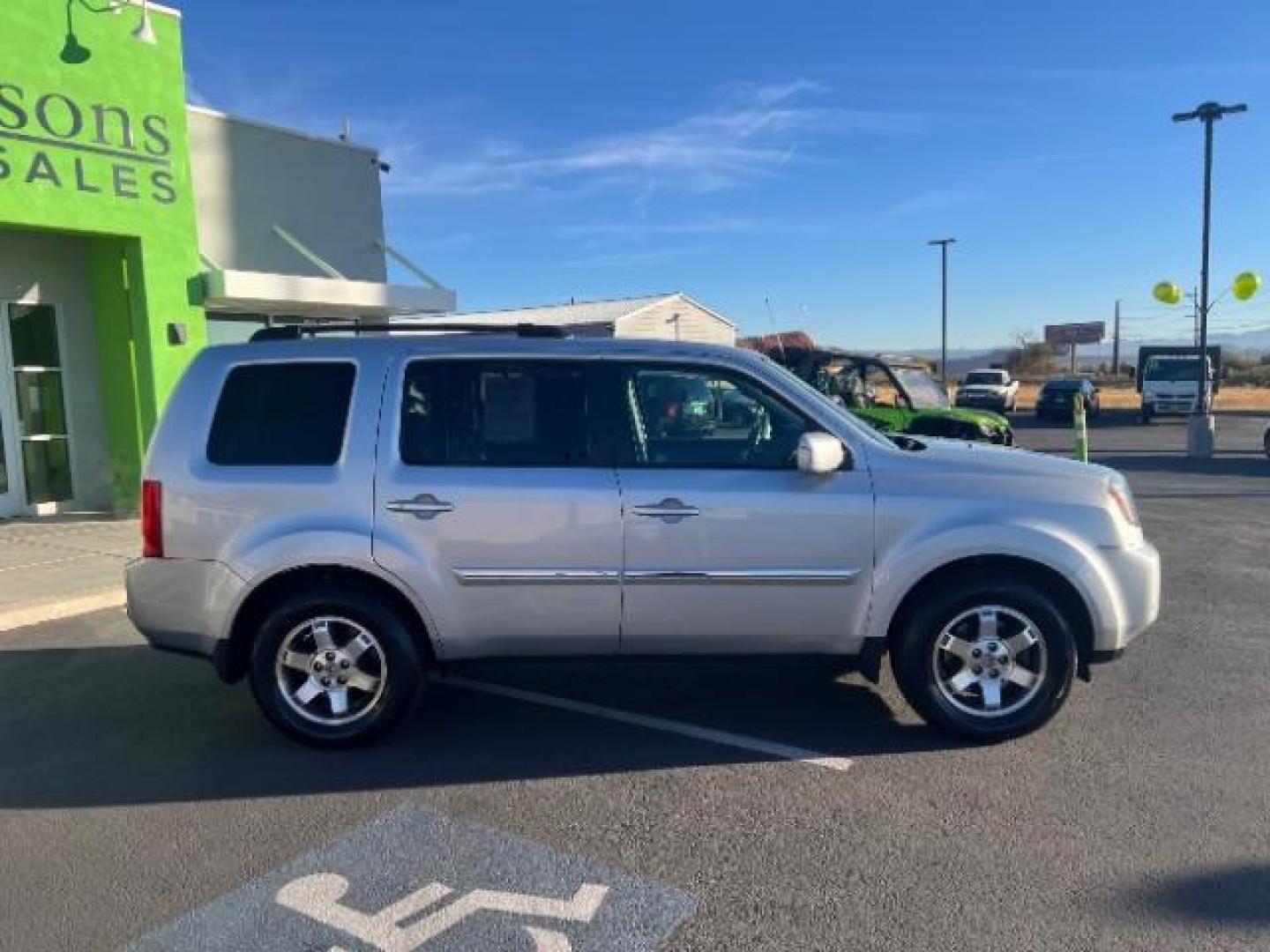 2011 Alabaster Silver Metallic /Black Leather Interior Honda Pilot Touring 4WD 5-Spd AT with DVD (5FNYF4H98BB) with an 3.5L V6 SOHC 24V engine, 5-Speed Automatic transmission, located at 940 North Main Street, Cedar City, UT, 84720, (435) 628-0023, 37.692936, -113.061897 - Photo#7