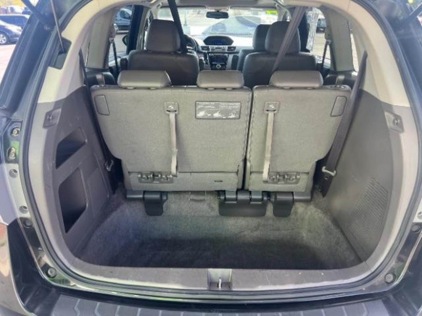 2014 Crystal Black Pearl /Gray Honda Odyssey EX-L (5FNRL5H6XEB) with an 3.5L V6 SOHC 24V engine, 6-Speed Automatic transmission, located at 1865 East Red Hills Pkwy, St. George, 84770, (435) 628-0023, 37.120850, -113.543640 - We specialize in helping ALL people get the best financing available. No matter your credit score, good, bad or none we can get you an amazing rate. Had a bankruptcy, divorce, or repossessions? We give you the green light to get your credit back on the road. Low down and affordable payments that fit - Photo#22
