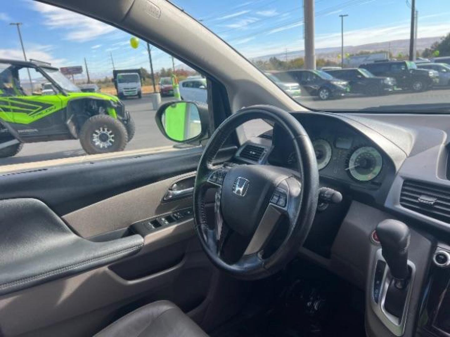 2014 Crystal Black Pearl /Gray Honda Odyssey EX-L (5FNRL5H6XEB) with an 3.5L V6 SOHC 24V engine, 6-Speed Automatic transmission, located at 1865 East Red Hills Pkwy, St. George, 84770, (435) 628-0023, 37.120850, -113.543640 - We specialize in helping ALL people get the best financing available. No matter your credit score, good, bad or none we can get you an amazing rate. Had a bankruptcy, divorce, or repossessions? We give you the green light to get your credit back on the road. Low down and affordable payments that fit - Photo#29