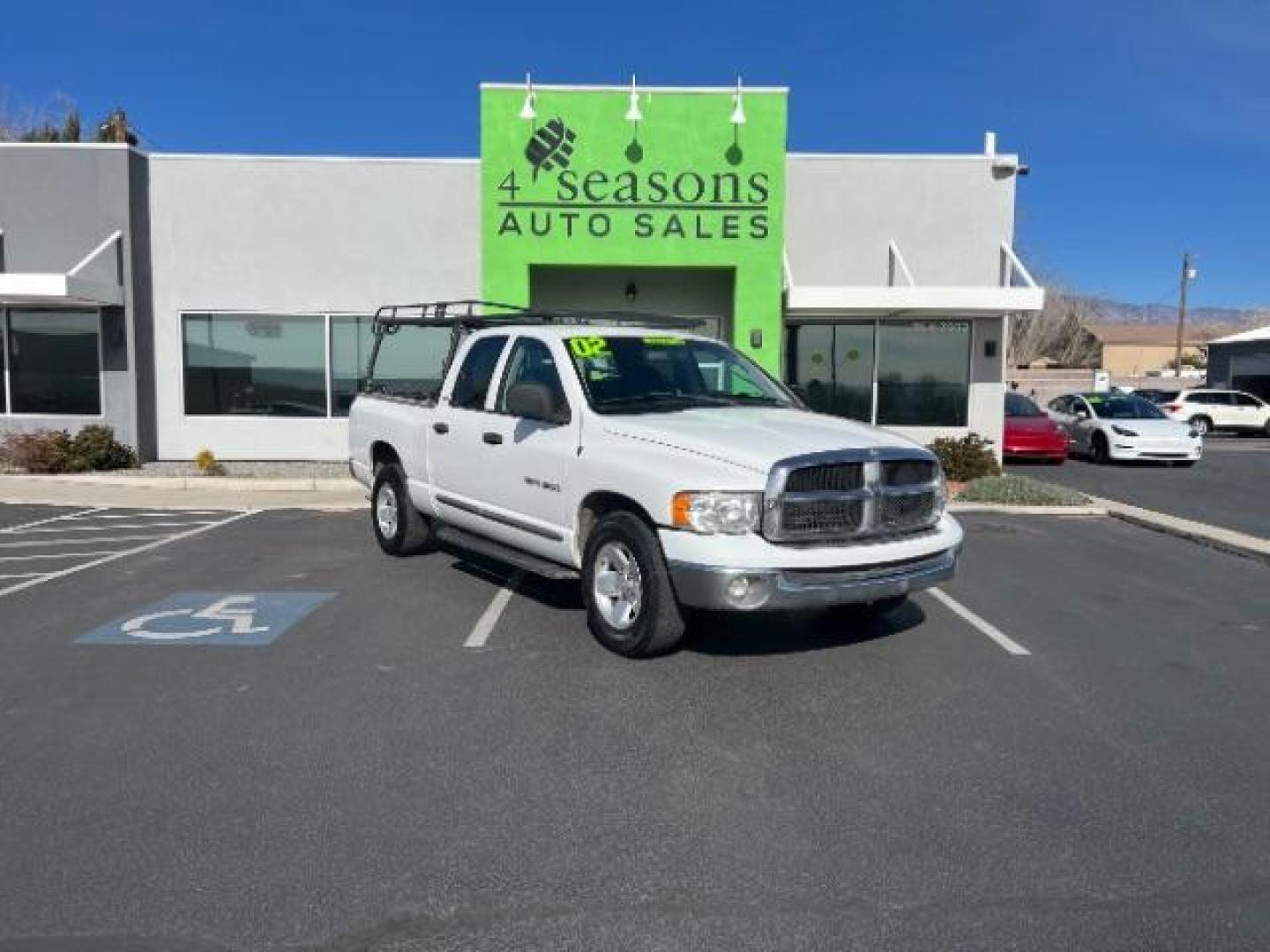 2002 Bright White /Dark Slate Gray Cloth Dodge Ram 1500 ST Quad Cab Short Bed 2WD (3D7HA18N22G) with an 4.7L V8 SOHC 16V engine, 4-Speed Automatic transmission, located at 1865 East Red Hills Pkwy, St. George, 84770, (435) 628-0023, 37.120850, -113.543640 - We specialize in helping ALL people get the best financing available. No matter your credit score, good, bad or none we can get you an amazing rate. Had a bankruptcy, divorce, or repossessions? We give you the green light to get your credit back on the road. Low down and affordable payments that fit - Photo#0