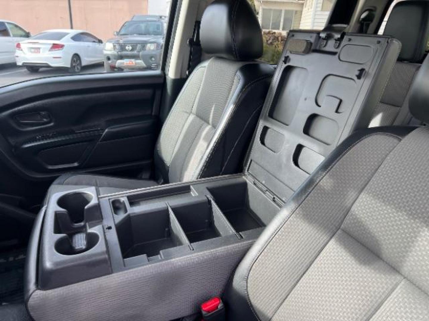 2017 Gun Metallic /Black, cloth Nissan Titan S Crew Cab 4WD (1N6AA1EJ6HN) with an 5.6L V8 DOHC 32V engine, 6-Speed Automatic transmission, located at 1865 East Red Hills Pkwy, St. George, 84770, (435) 628-0023, 37.120850, -113.543640 - Photo#19