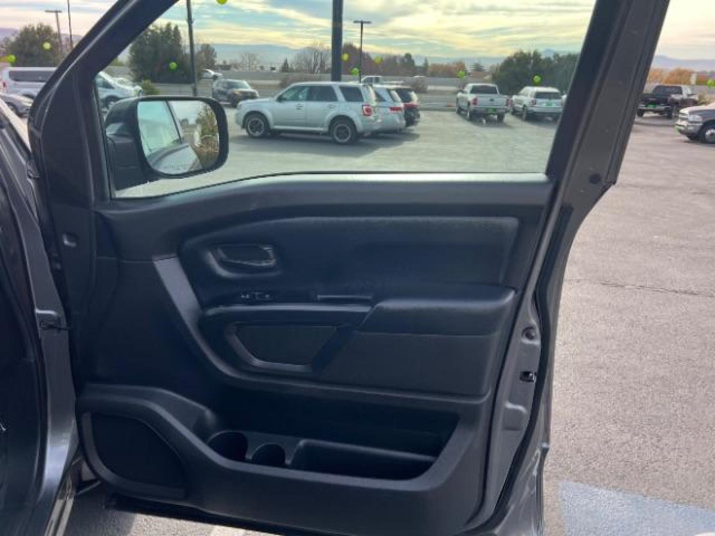 2017 Gun Metallic /Black, cloth Nissan Titan S Crew Cab 4WD (1N6AA1EJ6HN) with an 5.6L V8 DOHC 32V engine, 6-Speed Automatic transmission, located at 1865 East Red Hills Pkwy, St. George, 84770, (435) 628-0023, 37.120850, -113.543640 - Photo#27
