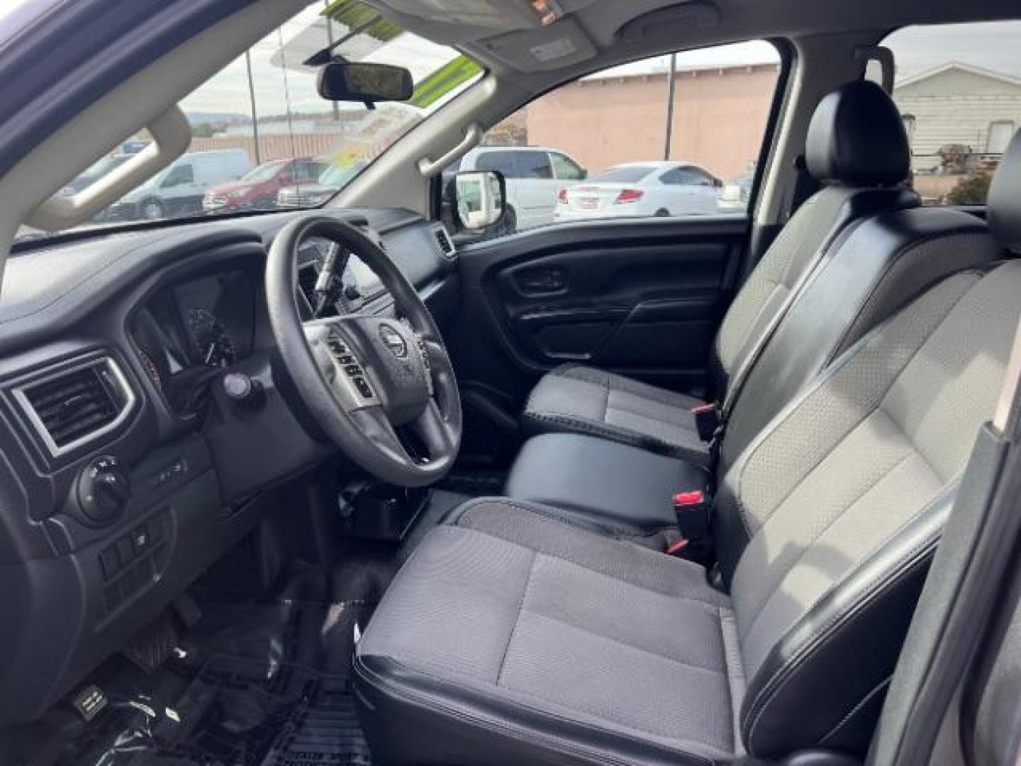 2017 Gun Metallic /Black, cloth Nissan Titan S Crew Cab 4WD (1N6AA1EJ6HN) with an 5.6L V8 DOHC 32V engine, 6-Speed Automatic transmission, located at 1865 East Red Hills Pkwy, St. George, 84770, (435) 628-0023, 37.120850, -113.543640 - Photo#14