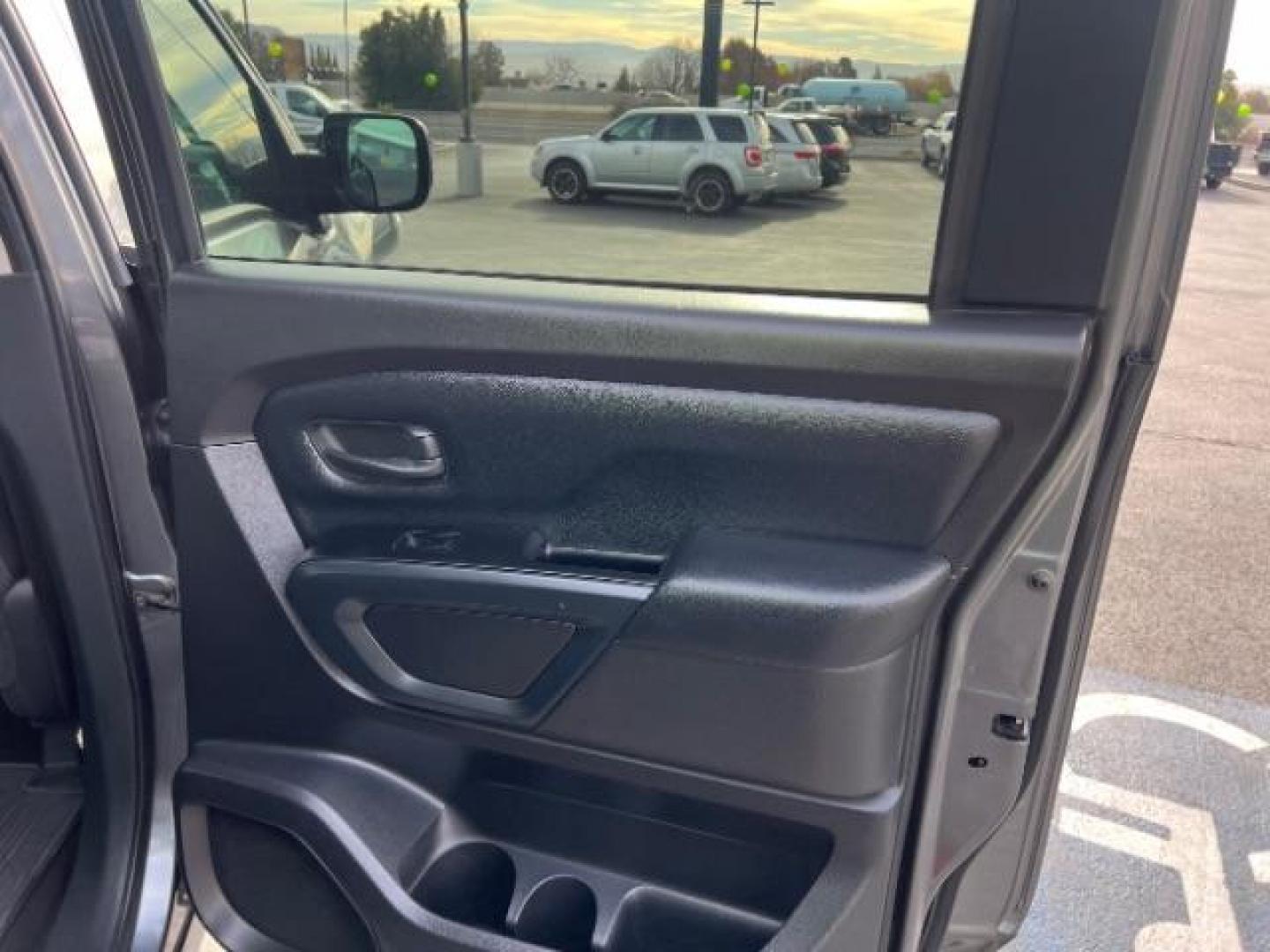 2017 Gun Metallic /Black, cloth Nissan Titan S Crew Cab 4WD (1N6AA1EJ6HN) with an 5.6L V8 DOHC 32V engine, 6-Speed Automatic transmission, located at 1865 East Red Hills Pkwy, St. George, 84770, (435) 628-0023, 37.120850, -113.543640 - Photo#25