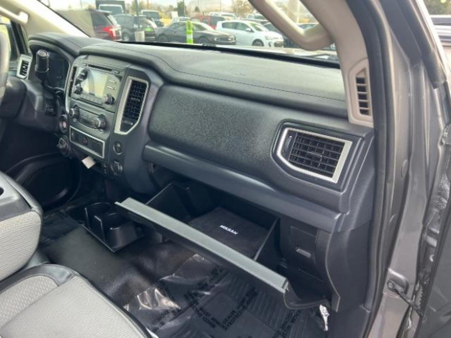 2017 Gun Metallic /Black, cloth Nissan Titan S Crew Cab 4WD (1N6AA1EJ6HN) with an 5.6L V8 DOHC 32V engine, 6-Speed Automatic transmission, located at 1865 East Red Hills Pkwy, St. George, 84770, (435) 628-0023, 37.120850, -113.543640 - Photo#29