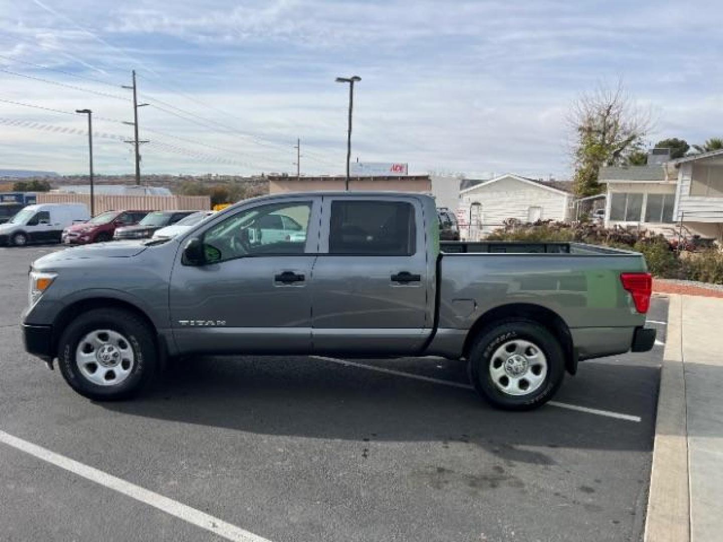 2017 Gun Metallic /Black, cloth Nissan Titan S Crew Cab 4WD (1N6AA1EJ6HN) with an 5.6L V8 DOHC 32V engine, 6-Speed Automatic transmission, located at 1865 East Red Hills Pkwy, St. George, 84770, (435) 628-0023, 37.120850, -113.543640 - Photo#3