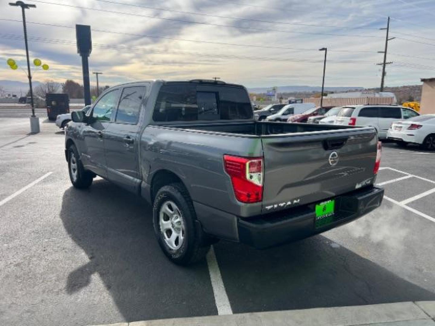 2017 Gun Metallic /Black, cloth Nissan Titan S Crew Cab 4WD (1N6AA1EJ6HN) with an 5.6L V8 DOHC 32V engine, 6-Speed Automatic transmission, located at 1865 East Red Hills Pkwy, St. George, 84770, (435) 628-0023, 37.120850, -113.543640 - Photo#4
