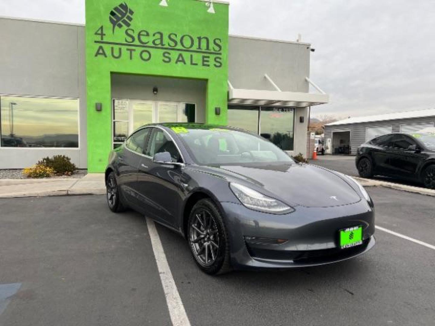 2019 gray /All Black, leatherette Tesla Model 3 Long Range (5YJ3E1EA7KF) with an ELECTRIC engine, 1-Speed Automatic transmission, located at 1865 East Red Hills Pkwy, St. George, 84770, (435) 628-0023, 37.120850, -113.543640 - Photo#0