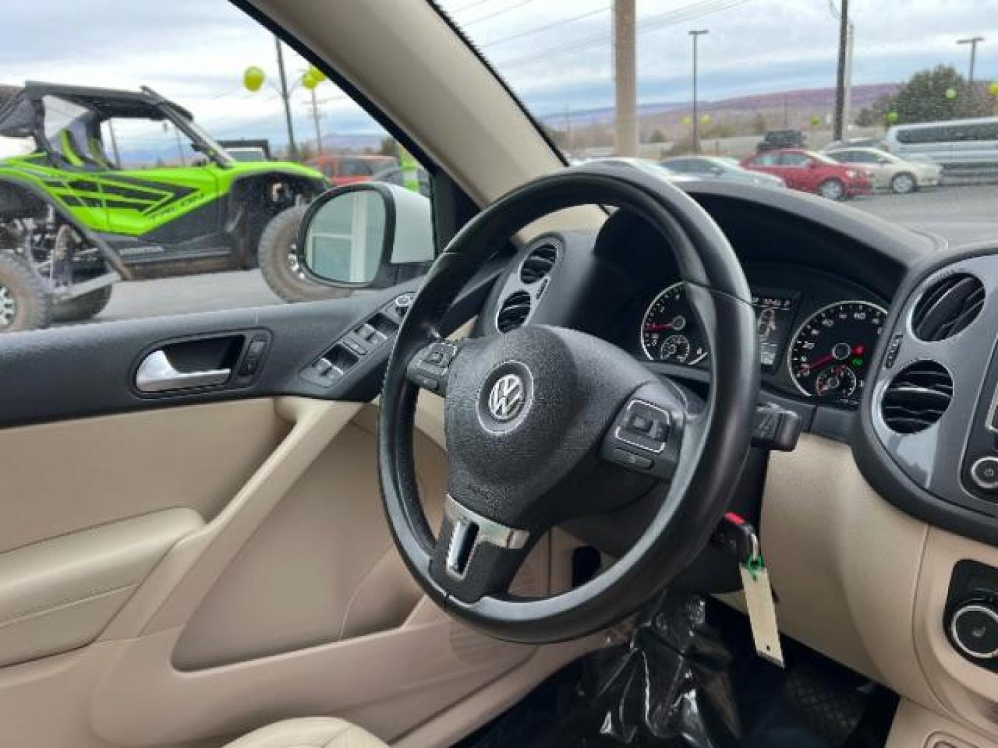 2012 Candy White /Desert Beige Leather Volkswagen Tiguan S 4Motion (WVGBV7AX6CW) with an 2.0L L4 DOHC 16V TURBO engine, 6-Speed Automatic transmission, located at 1865 East Red Hills Pkwy, St. George, 84770, (435) 628-0023, 37.120850, -113.543640 - Photo#31
