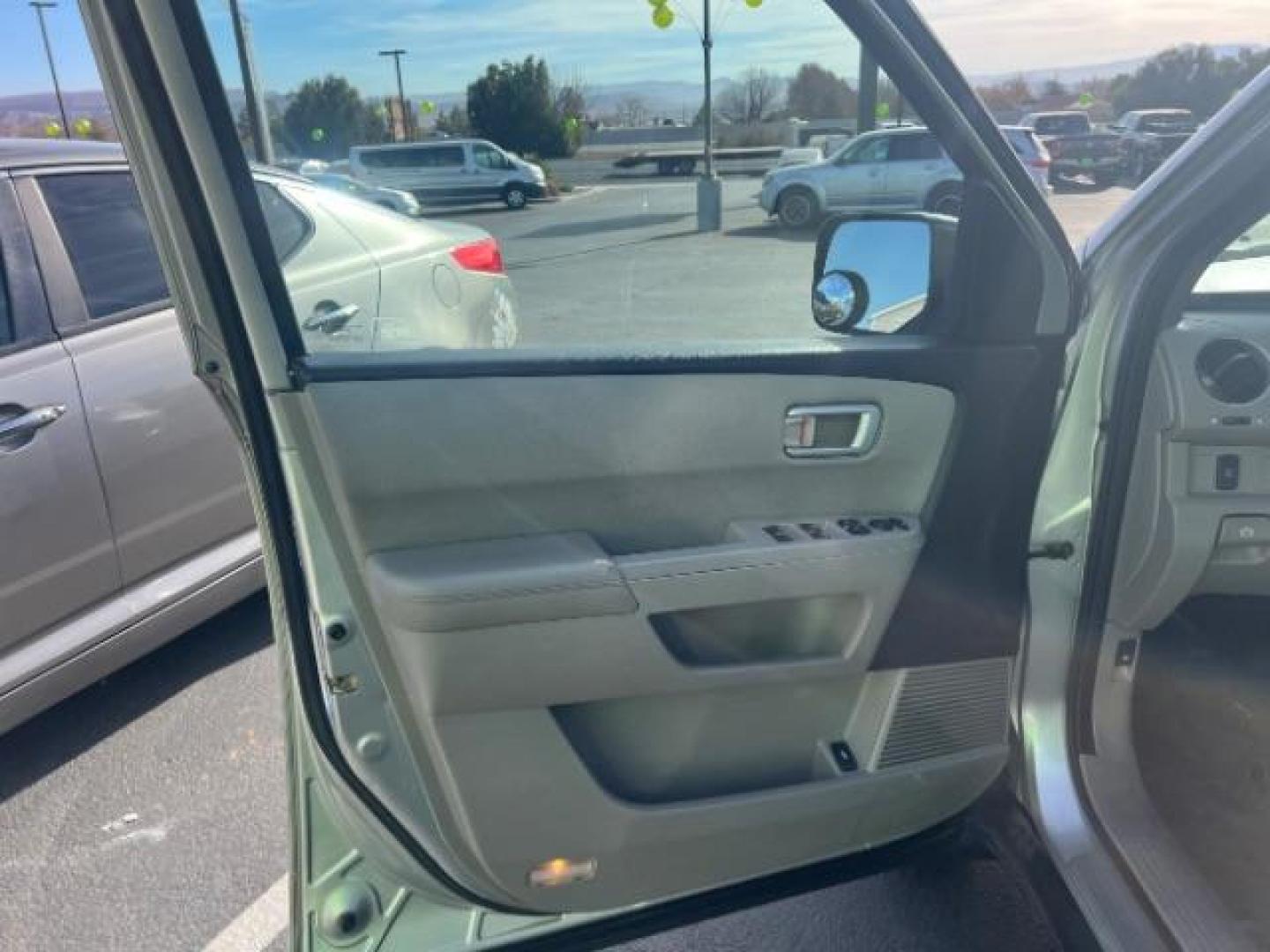 2011 Alabaster Silver Metallic /Black Cloth Interior Honda Pilot LX 2WD 5-Spd AT (5FNYF3H25BB) with an 3.5L V6 SOHC 24V engine, 5-Speed Automatic transmission, located at 1865 East Red Hills Pkwy, St. George, 84770, (435) 628-0023, 37.120850, -113.543640 - We specialize in helping ALL people get the best financing available. No matter your credit score, good, bad or none we can get you an amazing rate. Had a bankruptcy, divorce, or repossessions? We give you the green light to get your credit back on the road. Low down and affordable payments that fit - Photo#13
