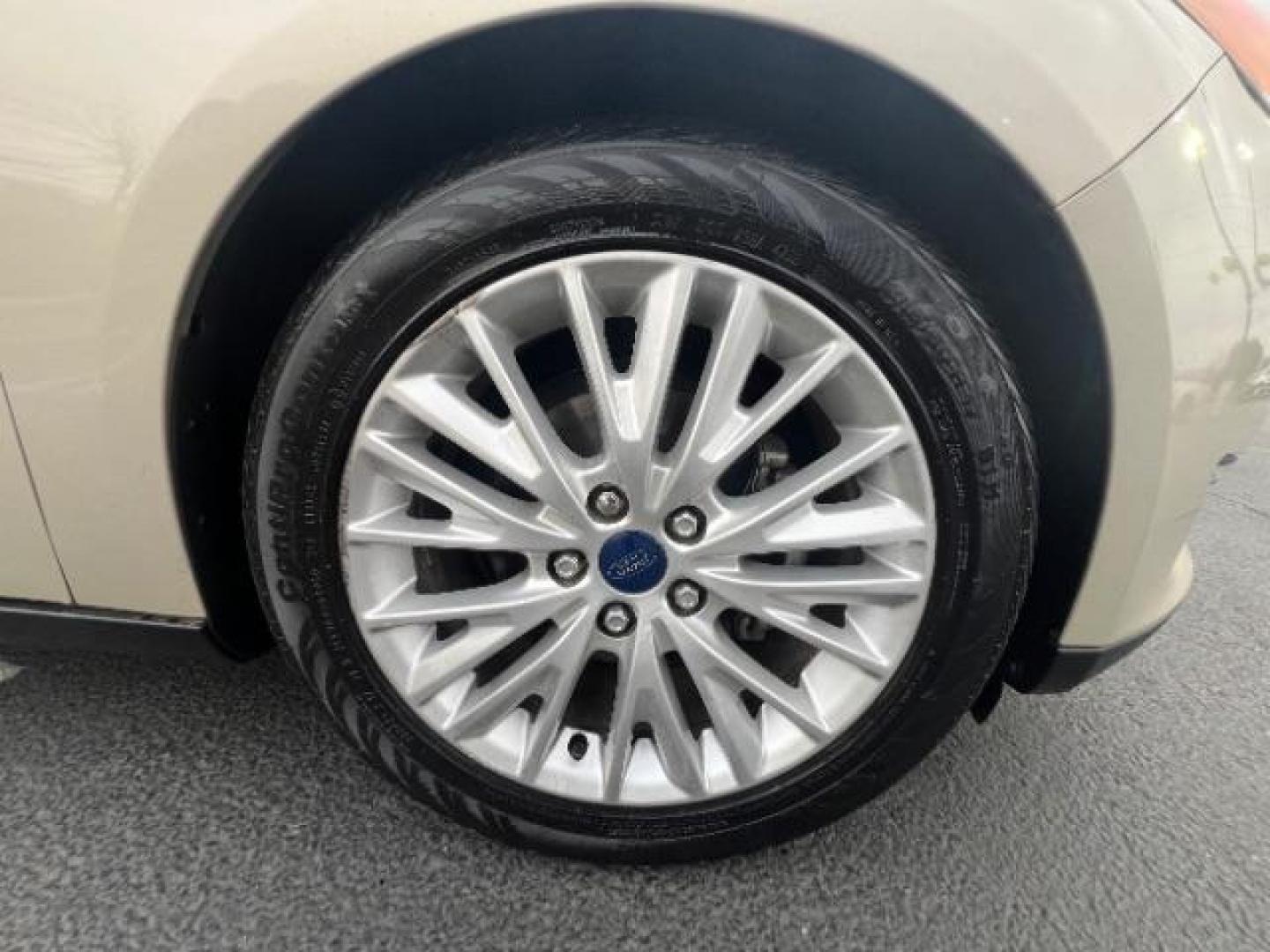 2018 White Gold Metallic /Medium Soft Ceramic, leather Ford Focus Titanium Sedan (1FADP3J27JL) with an 2.0L L4 DOHC 16V engine, 6-Speed Automatic transmission, located at 1865 East Red Hills Pkwy, St. George, 84770, (435) 628-0023, 37.120850, -113.543640 - We specialize in helping ALL people get the best financing available. No matter your credit score, good, bad or none we can get you an amazing rate. Had a bankruptcy, divorce, or repossessions? We give you the green light to get your credit back on the road. Low down and affordable payments that fit - Photo#10