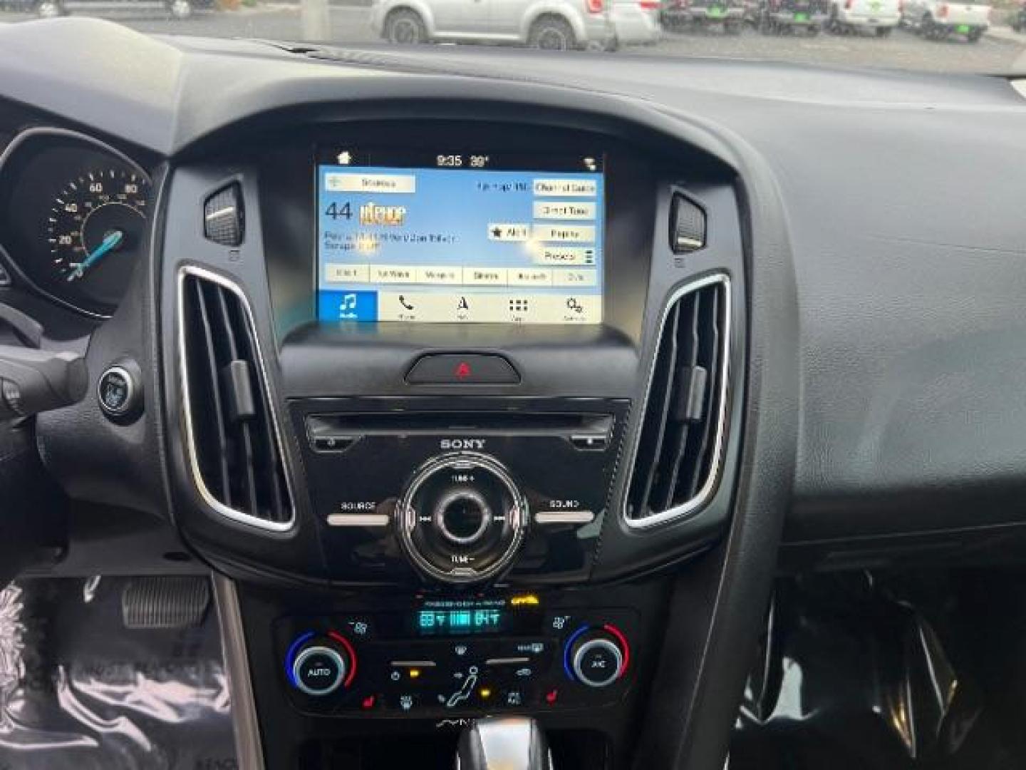 2018 White Gold Metallic /Medium Soft Ceramic, leather Ford Focus Titanium Sedan (1FADP3J27JL) with an 2.0L L4 DOHC 16V engine, 6-Speed Automatic transmission, located at 1865 East Red Hills Pkwy, St. George, 84770, (435) 628-0023, 37.120850, -113.543640 - We specialize in helping ALL people get the best financing available. No matter your credit score, good, bad or none we can get you an amazing rate. Had a bankruptcy, divorce, or repossessions? We give you the green light to get your credit back on the road. Low down and affordable payments that fit - Photo#18