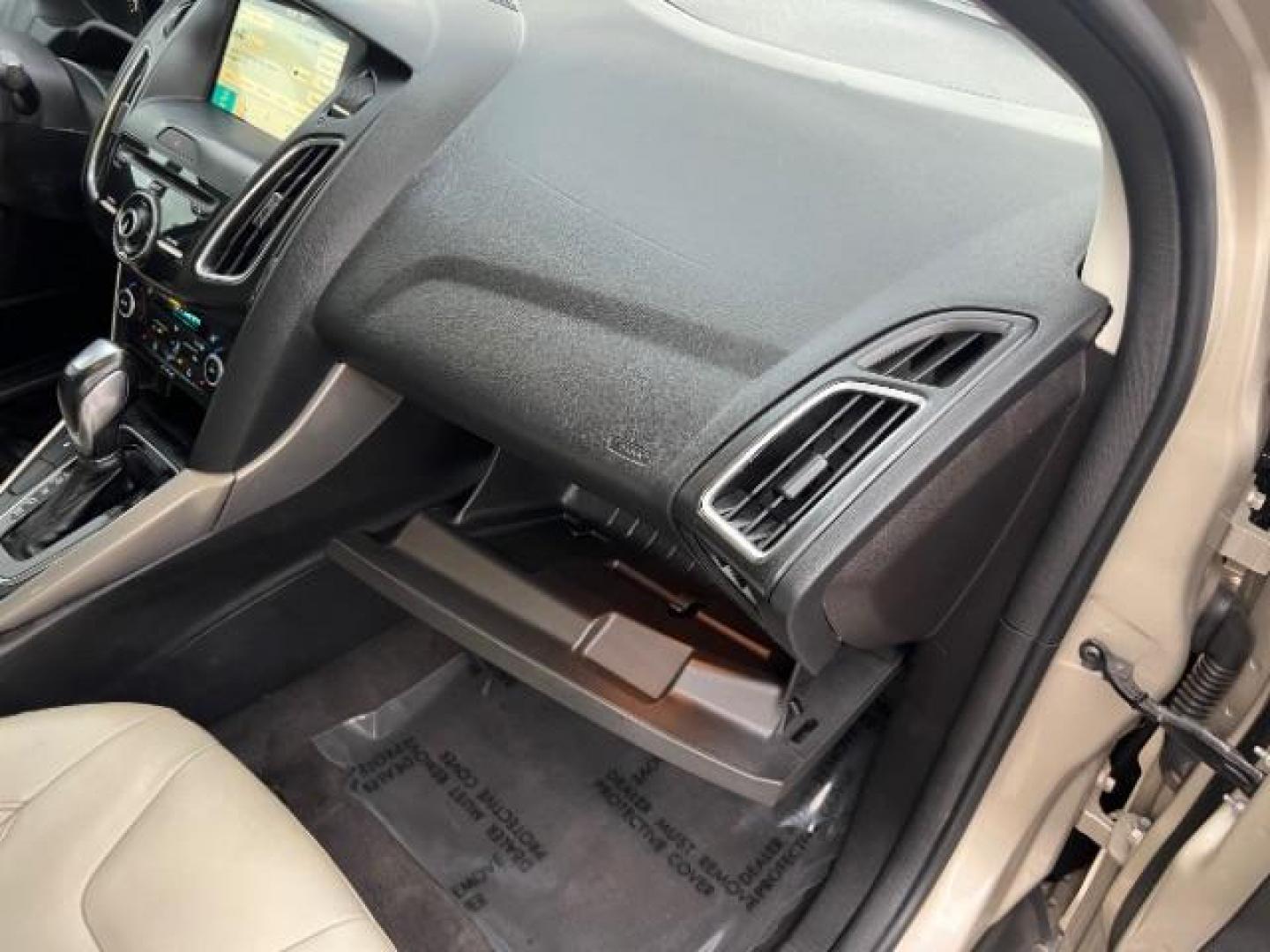 2018 White Gold Metallic /Medium Soft Ceramic, leather Ford Focus Titanium Sedan (1FADP3J27JL) with an 2.0L L4 DOHC 16V engine, 6-Speed Automatic transmission, located at 1865 East Red Hills Pkwy, St. George, 84770, (435) 628-0023, 37.120850, -113.543640 - We specialize in helping ALL people get the best financing available. No matter your credit score, good, bad or none we can get you an amazing rate. Had a bankruptcy, divorce, or repossessions? We give you the green light to get your credit back on the road. Low down and affordable payments that fit - Photo#31