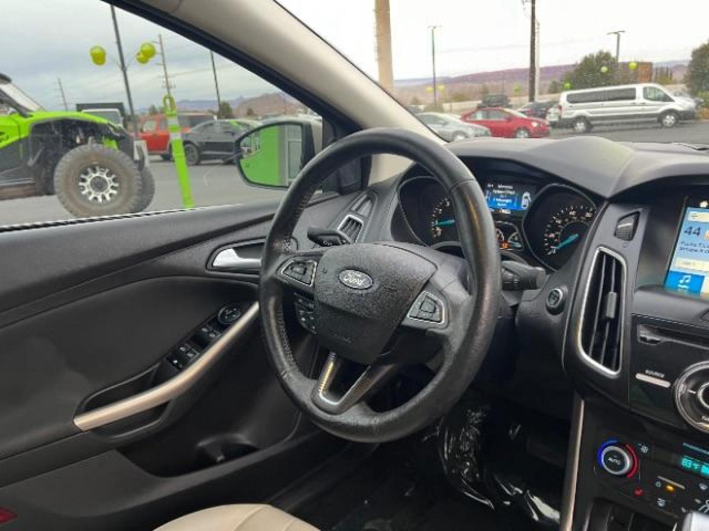2018 White Gold Metallic /Medium Soft Ceramic, leather Ford Focus Titanium Sedan (1FADP3J27JL) with an 2.0L L4 DOHC 16V engine, 6-Speed Automatic transmission, located at 1865 East Red Hills Pkwy, St. George, 84770, (435) 628-0023, 37.120850, -113.543640 - We specialize in helping ALL people get the best financing available. No matter your credit score, good, bad or none we can get you an amazing rate. Had a bankruptcy, divorce, or repossessions? We give you the green light to get your credit back on the road. Low down and affordable payments that fit - Photo#32