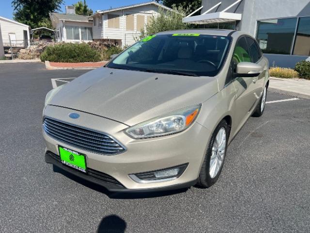 2018 White Gold Metallic /Medium Soft Ceramic, leather Ford Focus Titanium Sedan (1FADP3J27JL) with an 2.0L L4 DOHC 16V engine, 6-Speed Automatic transmission, located at 1865 East Red Hills Pkwy, St. George, 84770, (435) 628-0023, 37.120850, -113.543640 - We specialize in helping ALL people get the best financing available. No matter your credit score, good, bad or none we can get you an amazing rate. Had a bankruptcy, divorce, or repossessions? We give you the green light to get your credit back on the road. Low down and affordable payments that fit- Photo#2