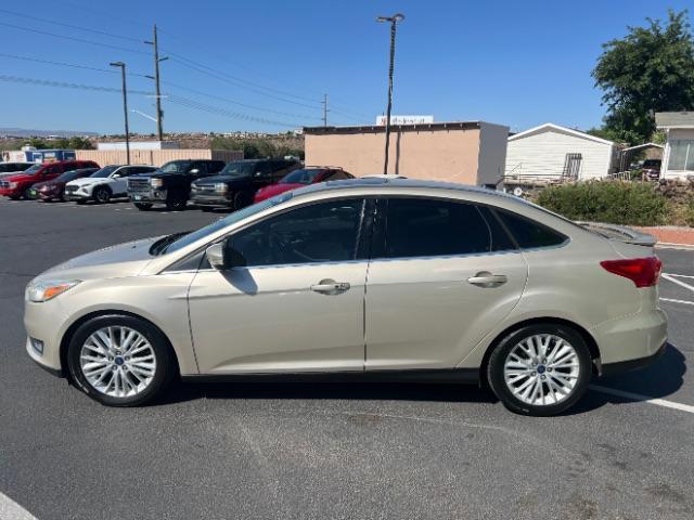 2018 White Gold Metallic /Medium Soft Ceramic, leather Ford Focus Titanium Sedan (1FADP3J27JL) with an 2.0L L4 DOHC 16V engine, 6-Speed Automatic transmission, located at 1865 East Red Hills Pkwy, St. George, 84770, (435) 628-0023, 37.120850, -113.543640 - We specialize in helping ALL people get the best financing available. No matter your credit score, good, bad or none we can get you an amazing rate. Had a bankruptcy, divorce, or repossessions? We give you the green light to get your credit back on the road. Low down and affordable payments that fit- Photo#3