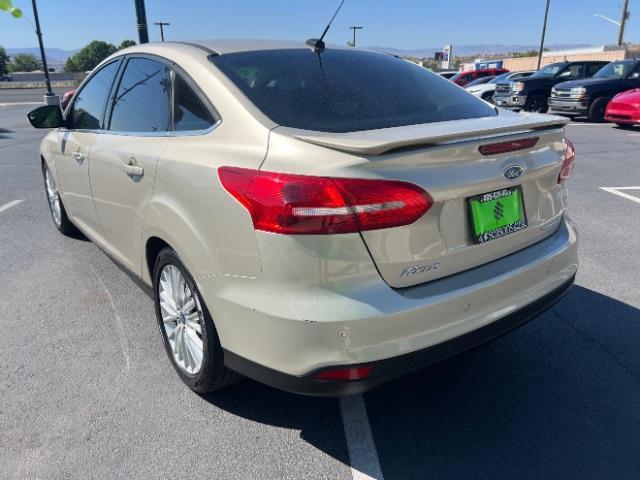 2018 White Gold Metallic /Medium Soft Ceramic, leather Ford Focus Titanium Sedan (1FADP3J27JL) with an 2.0L L4 DOHC 16V engine, 6-Speed Automatic transmission, located at 1865 East Red Hills Pkwy, St. George, 84770, (435) 628-0023, 37.120850, -113.543640 - We specialize in helping ALL people get the best financing available. No matter your credit score, good, bad or none we can get you an amazing rate. Had a bankruptcy, divorce, or repossessions? We give you the green light to get your credit back on the road. Low down and affordable payments that fit- Photo#4