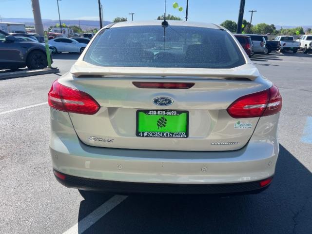 2018 White Gold Metallic /Medium Soft Ceramic, leather Ford Focus Titanium Sedan (1FADP3J27JL) with an 2.0L L4 DOHC 16V engine, 6-Speed Automatic transmission, located at 1865 East Red Hills Pkwy, St. George, 84770, (435) 628-0023, 37.120850, -113.543640 - We specialize in helping ALL people get the best financing available. No matter your credit score, good, bad or none we can get you an amazing rate. Had a bankruptcy, divorce, or repossessions? We give you the green light to get your credit back on the road. Low down and affordable payments that fit- Photo#5