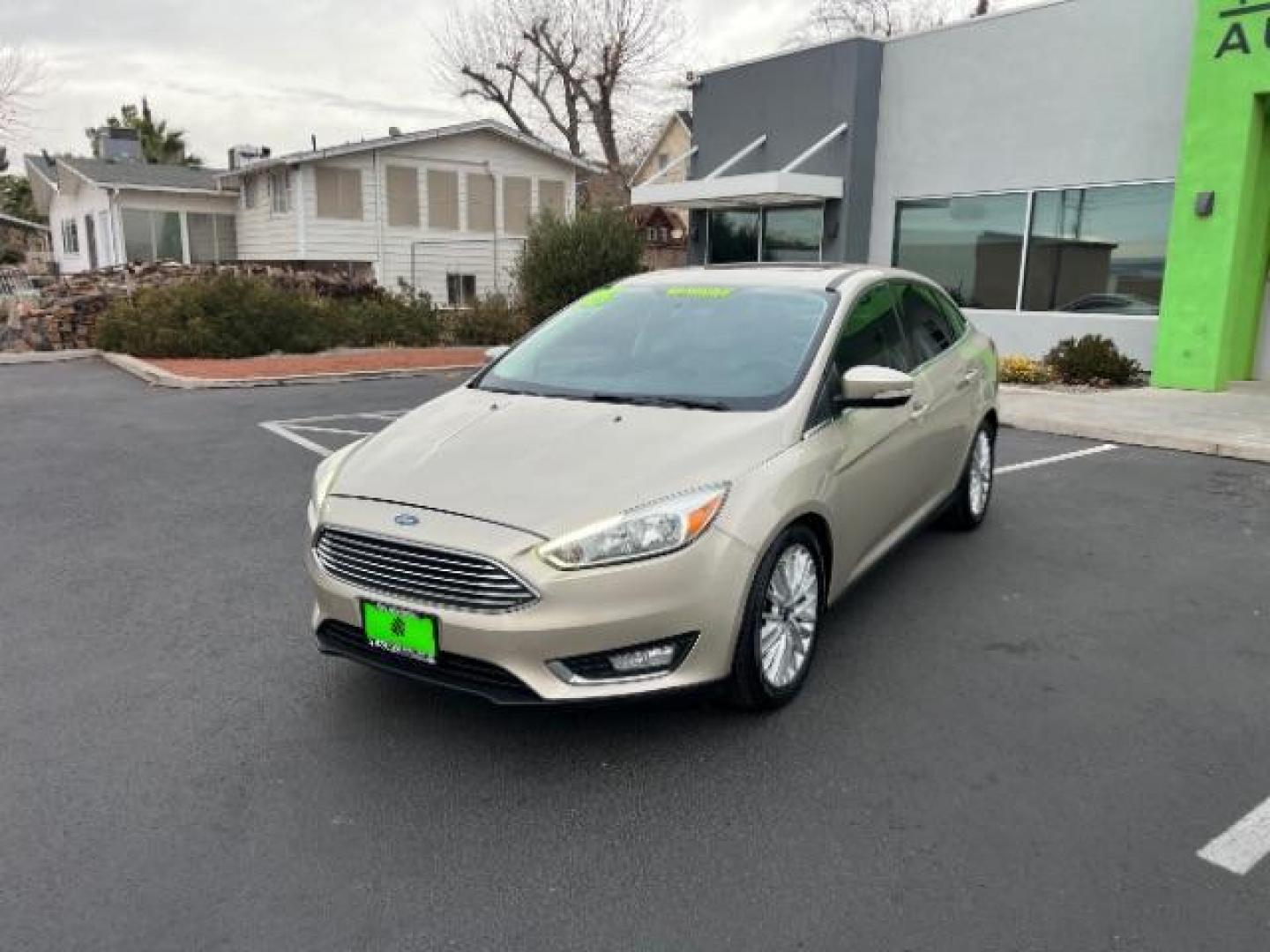 2018 White Gold Metallic /Medium Soft Ceramic, leather Ford Focus Titanium Sedan (1FADP3J27JL) with an 2.0L L4 DOHC 16V engine, 6-Speed Automatic transmission, located at 1865 East Red Hills Pkwy, St. George, 84770, (435) 628-0023, 37.120850, -113.543640 - We specialize in helping ALL people get the best financing available. No matter your credit score, good, bad or none we can get you an amazing rate. Had a bankruptcy, divorce, or repossessions? We give you the green light to get your credit back on the road. Low down and affordable payments that fit - Photo#2