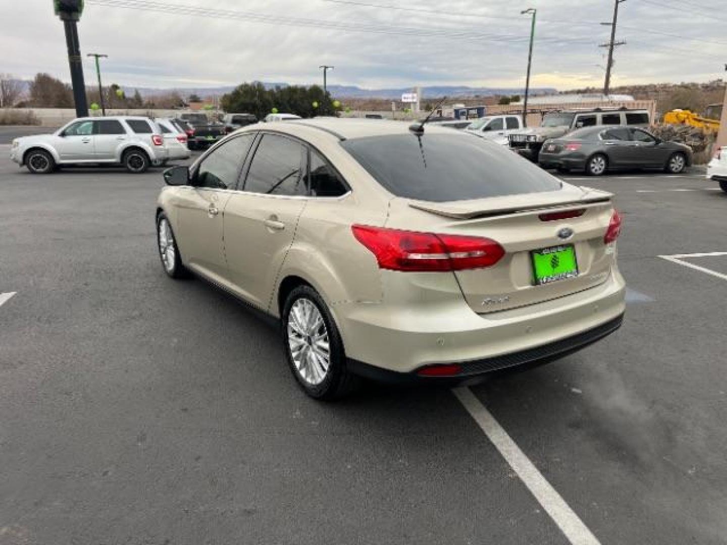 2018 White Gold Metallic /Medium Soft Ceramic, leather Ford Focus Titanium Sedan (1FADP3J27JL) with an 2.0L L4 DOHC 16V engine, 6-Speed Automatic transmission, located at 1865 East Red Hills Pkwy, St. George, 84770, (435) 628-0023, 37.120850, -113.543640 - We specialize in helping ALL people get the best financing available. No matter your credit score, good, bad or none we can get you an amazing rate. Had a bankruptcy, divorce, or repossessions? We give you the green light to get your credit back on the road. Low down and affordable payments that fit - Photo#4