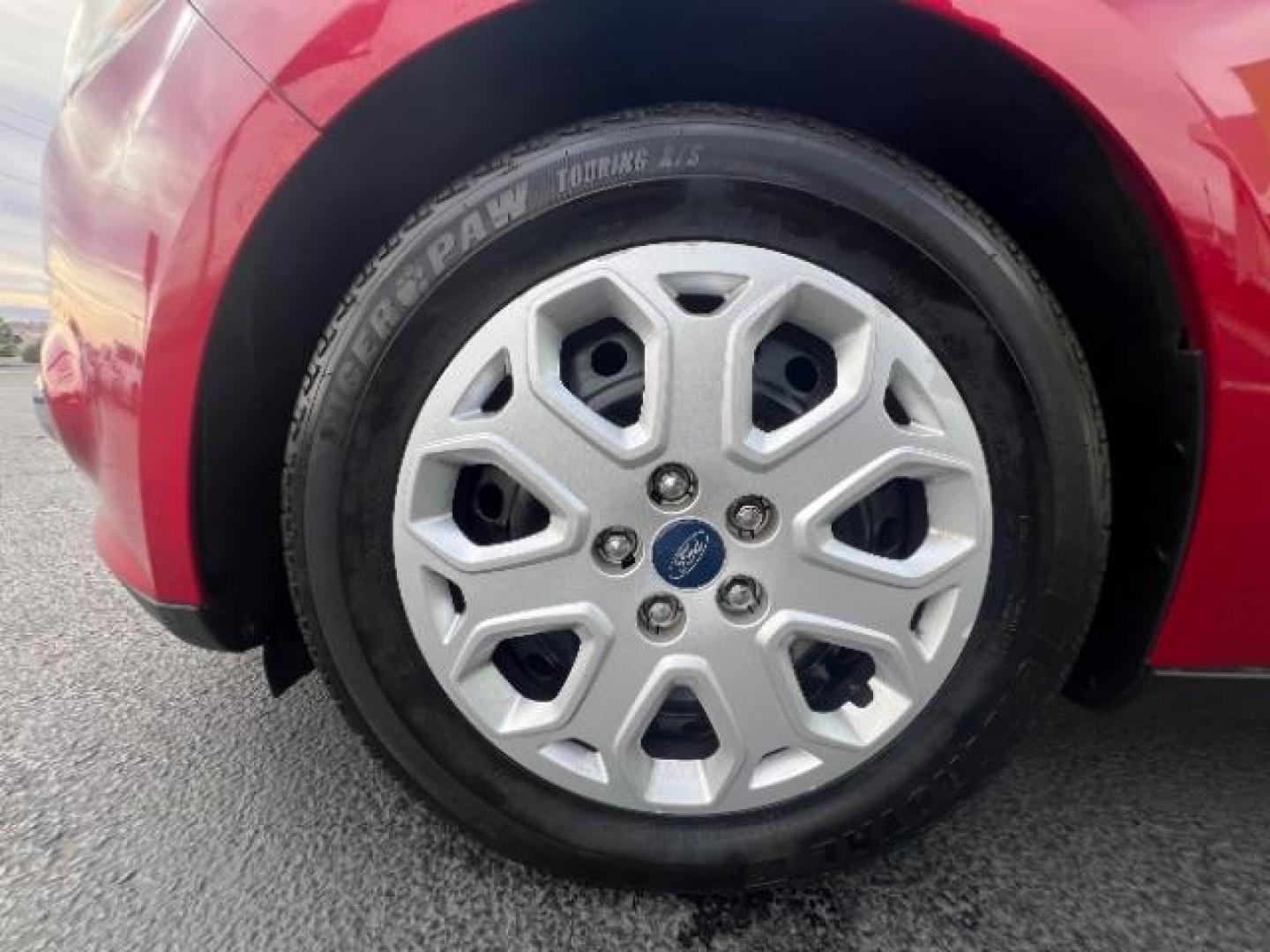 2012 Race Red /Charcoal Black/Metal Gray Cloth Interior Ford Focus SE (1FAHP3K22CL) with an 2.0L L4 DOHC 16V engine, located at 1865 East Red Hills Pkwy, St. George, 84770, (435) 628-0023, 37.120850, -113.543640 - We specialize in helping ALL people get the best financing available. No matter your credit score, good, bad or none we can get you an amazing rate. Had a bankruptcy, divorce, or repossessions? We give you the green light to get your credit back on the road. Low down and affordable payments that fit - Photo#11