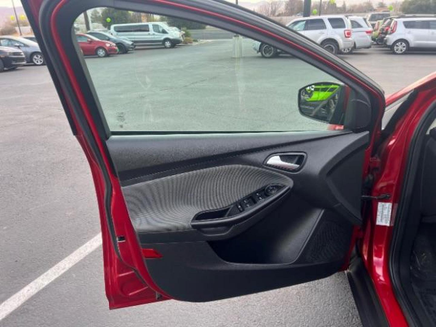 2012 Race Red /Charcoal Black/Metal Gray Cloth Interior Ford Focus SE (1FAHP3K22CL) with an 2.0L L4 DOHC 16V engine, located at 1865 East Red Hills Pkwy, St. George, 84770, (435) 628-0023, 37.120850, -113.543640 - We specialize in helping ALL people get the best financing available. No matter your credit score, good, bad or none we can get you an amazing rate. Had a bankruptcy, divorce, or repossessions? We give you the green light to get your credit back on the road. Low down and affordable payments that fit - Photo#13