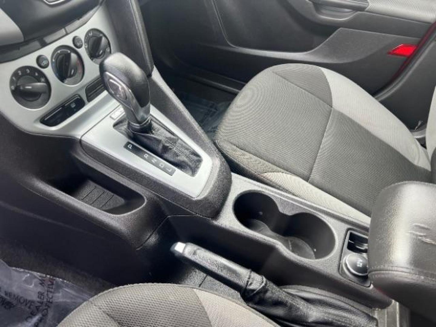 2012 Race Red /Charcoal Black/Metal Gray Cloth Interior Ford Focus SE (1FAHP3K22CL) with an 2.0L L4 DOHC 16V engine, located at 1865 East Red Hills Pkwy, St. George, 84770, (435) 628-0023, 37.120850, -113.543640 - We specialize in helping ALL people get the best financing available. No matter your credit score, good, bad or none we can get you an amazing rate. Had a bankruptcy, divorce, or repossessions? We give you the green light to get your credit back on the road. Low down and affordable payments that fit - Photo#17