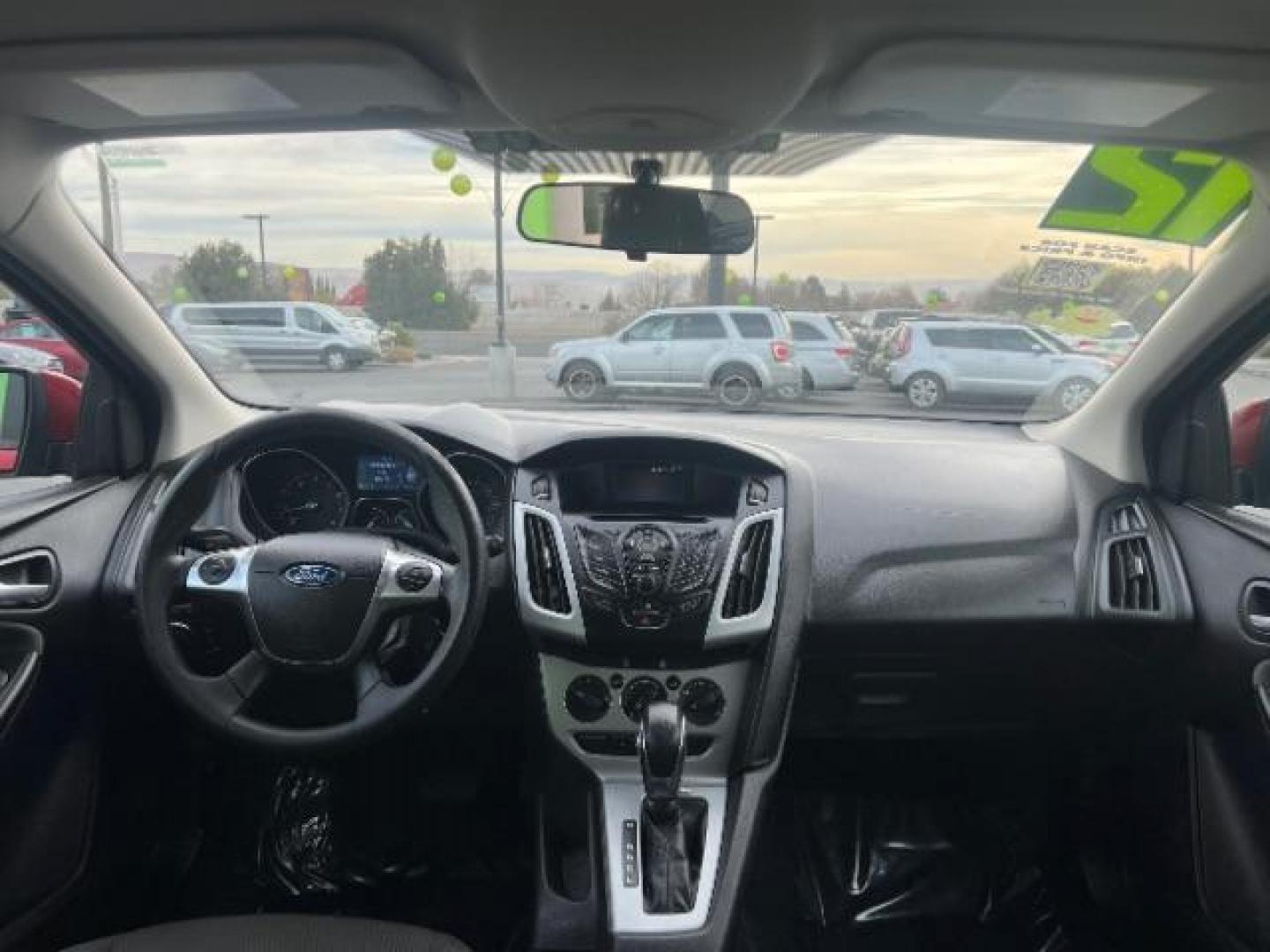 2012 Race Red /Charcoal Black/Metal Gray Cloth Interior Ford Focus SE (1FAHP3K22CL) with an 2.0L L4 DOHC 16V engine, located at 1865 East Red Hills Pkwy, St. George, 84770, (435) 628-0023, 37.120850, -113.543640 - We specialize in helping ALL people get the best financing available. No matter your credit score, good, bad or none we can get you an amazing rate. Had a bankruptcy, divorce, or repossessions? We give you the green light to get your credit back on the road. Low down and affordable payments that fit - Photo#25