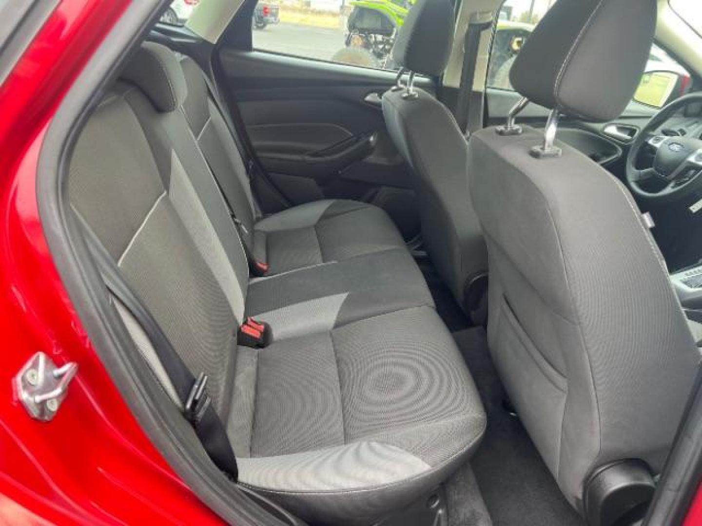 2012 Race Red /Charcoal Black/Metal Gray Cloth Interior Ford Focus SE (1FAHP3K22CL) with an 2.0L L4 DOHC 16V engine, located at 1865 East Red Hills Pkwy, St. George, 84770, (435) 628-0023, 37.120850, -113.543640 - We specialize in helping ALL people get the best financing available. No matter your credit score, good, bad or none we can get you an amazing rate. Had a bankruptcy, divorce, or repossessions? We give you the green light to get your credit back on the road. Low down and affordable payments that fit - Photo#27