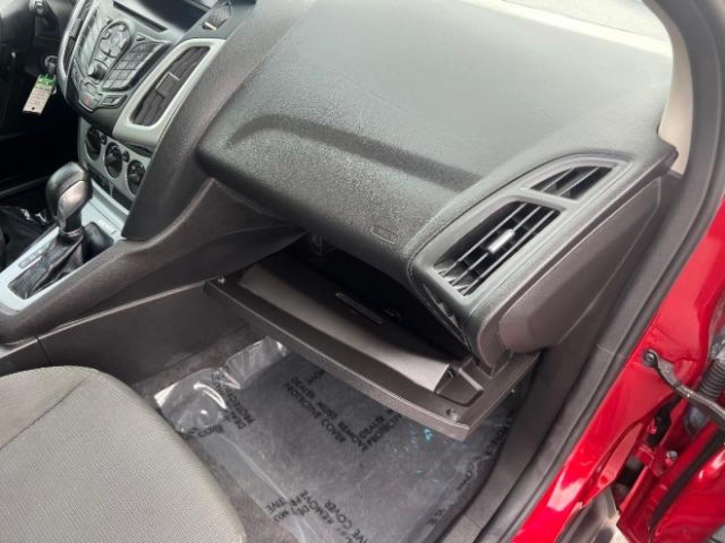 2012 Race Red /Charcoal Black/Metal Gray Cloth Interior Ford Focus SE (1FAHP3K22CL) with an 2.0L L4 DOHC 16V engine, located at 1865 East Red Hills Pkwy, St. George, 84770, (435) 628-0023, 37.120850, -113.543640 - We specialize in helping ALL people get the best financing available. No matter your credit score, good, bad or none we can get you an amazing rate. Had a bankruptcy, divorce, or repossessions? We give you the green light to get your credit back on the road. Low down and affordable payments that fit - Photo#30