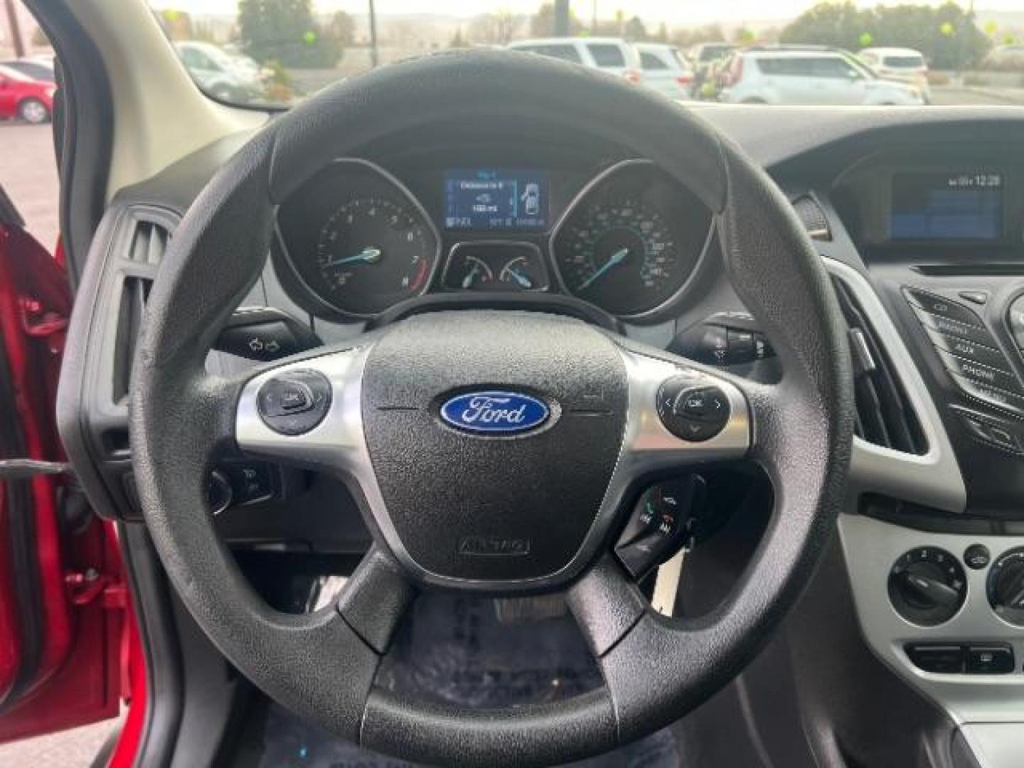 2012 Race Red /Charcoal Black/Metal Gray Cloth Interior Ford Focus SE (1FAHP3K22CL) with an 2.0L L4 DOHC 16V engine, located at 1865 East Red Hills Pkwy, St. George, 84770, (435) 628-0023, 37.120850, -113.543640 - We specialize in helping ALL people get the best financing available. No matter your credit score, good, bad or none we can get you an amazing rate. Had a bankruptcy, divorce, or repossessions? We give you the green light to get your credit back on the road. Low down and affordable payments that fit - Photo#15