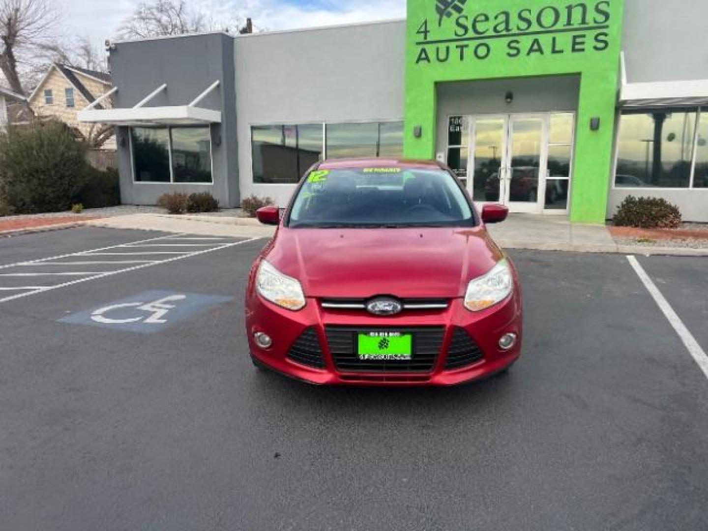 2012 Race Red /Charcoal Black/Metal Gray Cloth Interior Ford Focus SE (1FAHP3K22CL) with an 2.0L L4 DOHC 16V engine, located at 1865 East Red Hills Pkwy, St. George, 84770, (435) 628-0023, 37.120850, -113.543640 - We specialize in helping ALL people get the best financing available. No matter your credit score, good, bad or none we can get you an amazing rate. Had a bankruptcy, divorce, or repossessions? We give you the green light to get your credit back on the road. Low down and affordable payments that fit - Photo#1