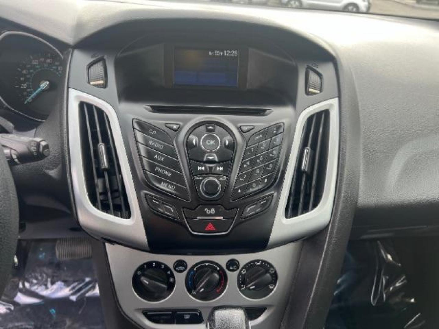 2012 Race Red /Charcoal Black/Metal Gray Cloth Interior Ford Focus SE (1FAHP3K22CL) with an 2.0L L4 DOHC 16V engine, located at 1865 East Red Hills Pkwy, St. George, 84770, (435) 628-0023, 37.120850, -113.543640 - We specialize in helping ALL people get the best financing available. No matter your credit score, good, bad or none we can get you an amazing rate. Had a bankruptcy, divorce, or repossessions? We give you the green light to get your credit back on the road. Low down and affordable payments that fit - Photo#19