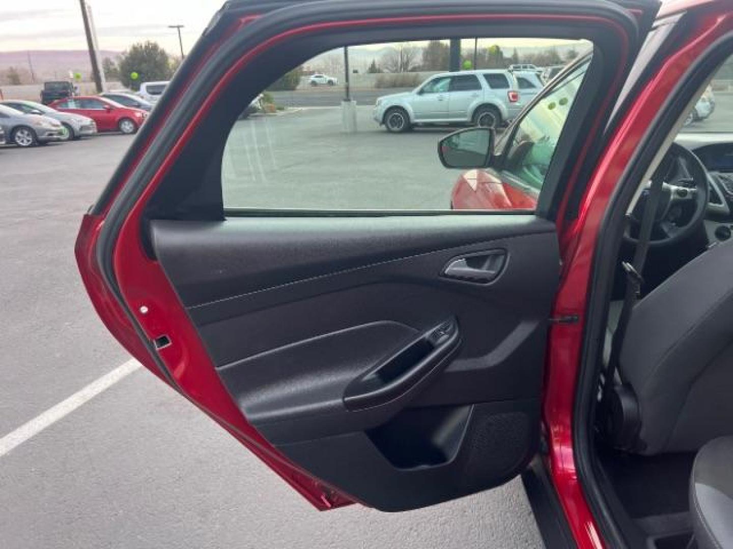 2012 Race Red /Charcoal Black/Metal Gray Cloth Interior Ford Focus SE (1FAHP3K22CL) with an 2.0L L4 DOHC 16V engine, located at 1865 East Red Hills Pkwy, St. George, 84770, (435) 628-0023, 37.120850, -113.543640 - We specialize in helping ALL people get the best financing available. No matter your credit score, good, bad or none we can get you an amazing rate. Had a bankruptcy, divorce, or repossessions? We give you the green light to get your credit back on the road. Low down and affordable payments that fit - Photo#21