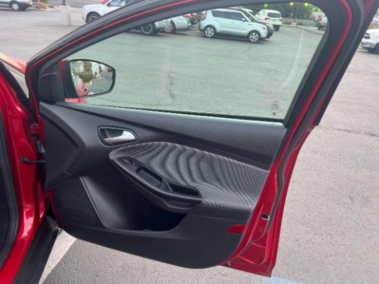 2012 Race Red /Charcoal Black/Metal Gray Cloth Interior Ford Focus SE (1FAHP3K22CL) with an 2.0L L4 DOHC 16V engine, located at 1865 East Red Hills Pkwy, St. George, 84770, (435) 628-0023, 37.120850, -113.543640 - We specialize in helping ALL people get the best financing available. No matter your credit score, good, bad or none we can get you an amazing rate. Had a bankruptcy, divorce, or repossessions? We give you the green light to get your credit back on the road. Low down and affordable payments that fit - Photo#26