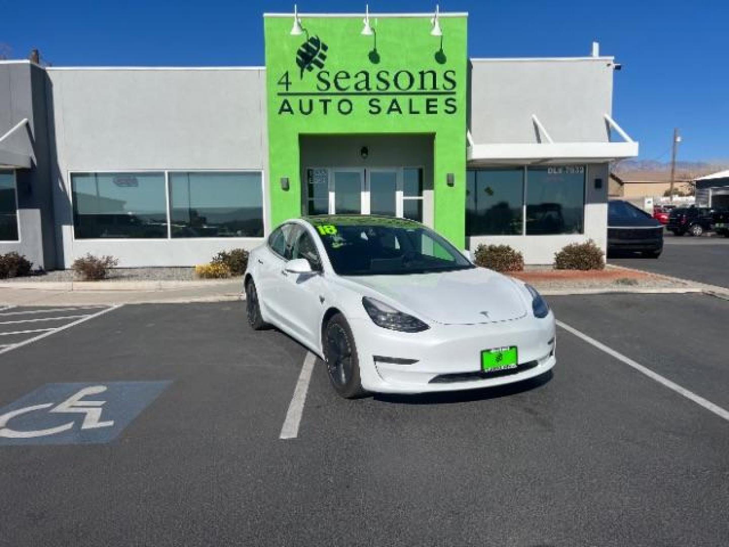 2018 White /Black Tesla Model 3 Long Range (5YJ3E1EB8JF) with an ELECTRIC engine, 1-Speed Automatic transmission, located at 1865 East Red Hills Pkwy, St. George, 84770, (435) 628-0023, 37.120850, -113.543640 - COMING SOON! ****Price includes $4k IRS EV REBATE**** We are setup with IRS to file the rebate directly and take credit off the price of car. Check with IRS EV website to be sure you qualify. Trump has threatened to end rebate so ACT FAST! Excellent AWD, Long Range, 300 miles on full charge, ugrad - Photo#0