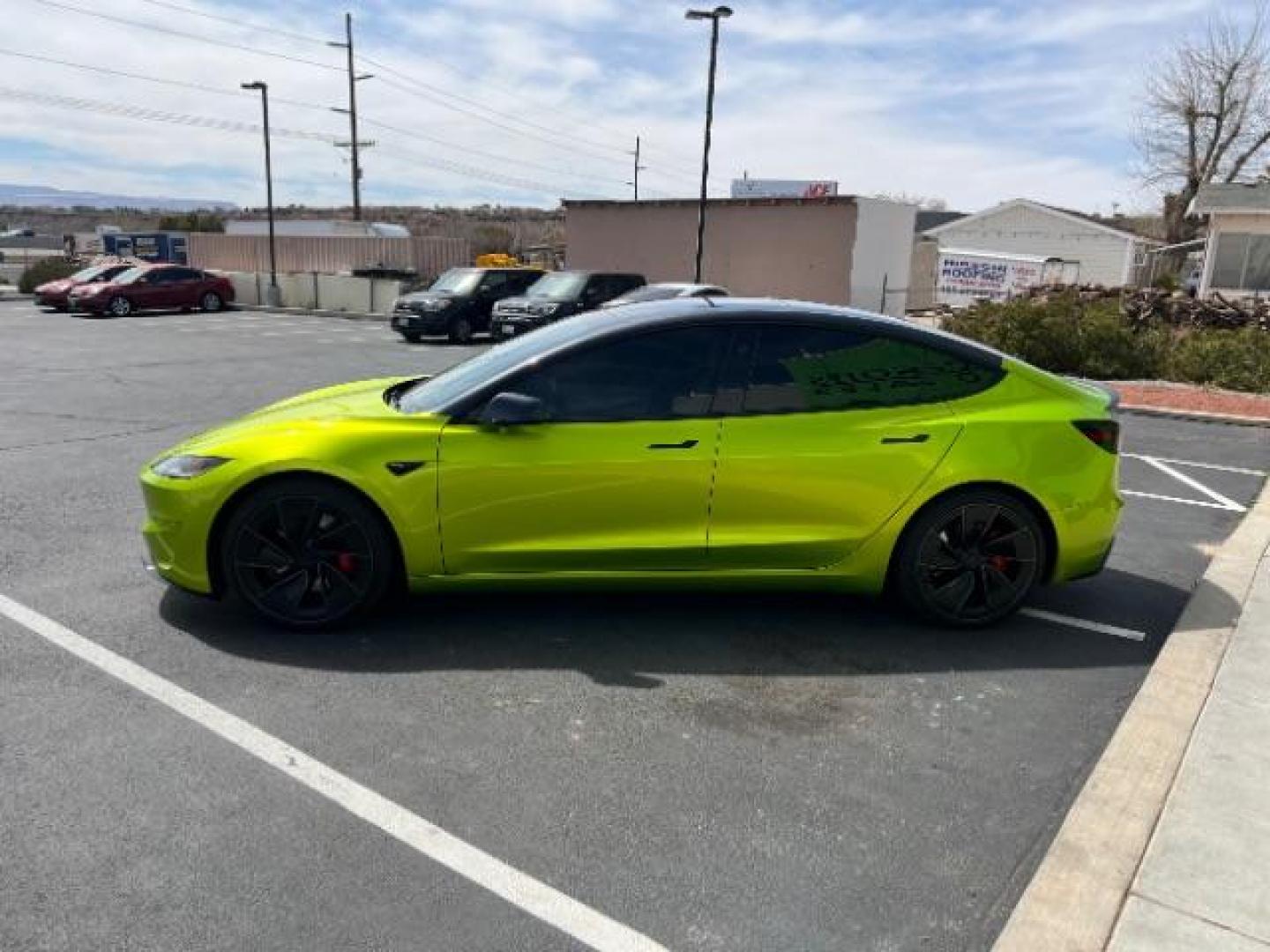 2024 Green /Black and White Tesla Model 3 Performance (5YJ3E1ET4RF) with an ELECTRIC engine, 1-Speed Automatic transmission, located at 1865 East Red Hills Pkwy, St. George, 84770, (435) 628-0023, 37.120850, -113.543640 - Green wrap! Experience the exhilarating performance of the near-new, redesigned 2024 Tesla Model 3 Performance. This high-performance sedan boasts 510 horsepower, accelerating from 0 to 60 mph in just 2.9 seconds, with a top speed of 163 mph. Equipped with adaptive suspension and track mode, it offe - Photo#3