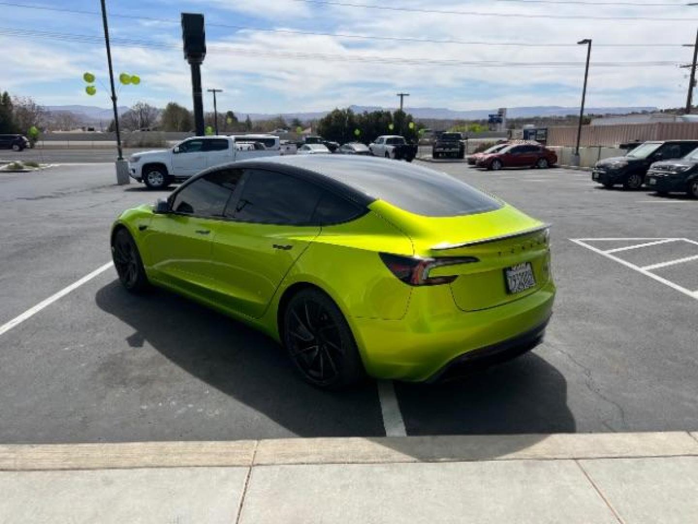 2024 Green /Black and White Tesla Model 3 Performance (5YJ3E1ET4RF) with an ELECTRIC engine, 1-Speed Automatic transmission, located at 1865 East Red Hills Pkwy, St. George, 84770, (435) 628-0023, 37.120850, -113.543640 - Green wrap! Experience the exhilarating performance of the near-new, redesigned 2024 Tesla Model 3 Performance. This high-performance sedan boasts 510 horsepower, accelerating from 0 to 60 mph in just 2.9 seconds, with a top speed of 163 mph. Equipped with adaptive suspension and track mode, it offe - Photo#4