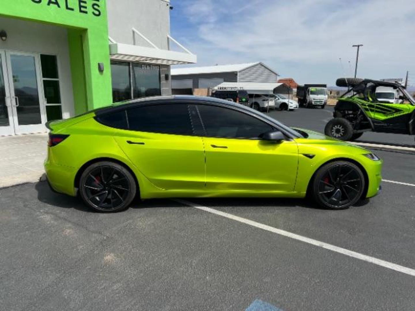 2024 Green /Black and White Tesla Model 3 Performance (5YJ3E1ET4RF) with an ELECTRIC engine, 1-Speed Automatic transmission, located at 1865 East Red Hills Pkwy, St. George, 84770, (435) 628-0023, 37.120850, -113.543640 - Green wrap! Experience the exhilarating performance of the near-new, redesigned 2024 Tesla Model 3 Performance. This high-performance sedan boasts 510 horsepower, accelerating from 0 to 60 mph in just 2.9 seconds, with a top speed of 163 mph. Equipped with adaptive suspension and track mode, it offe - Photo#7