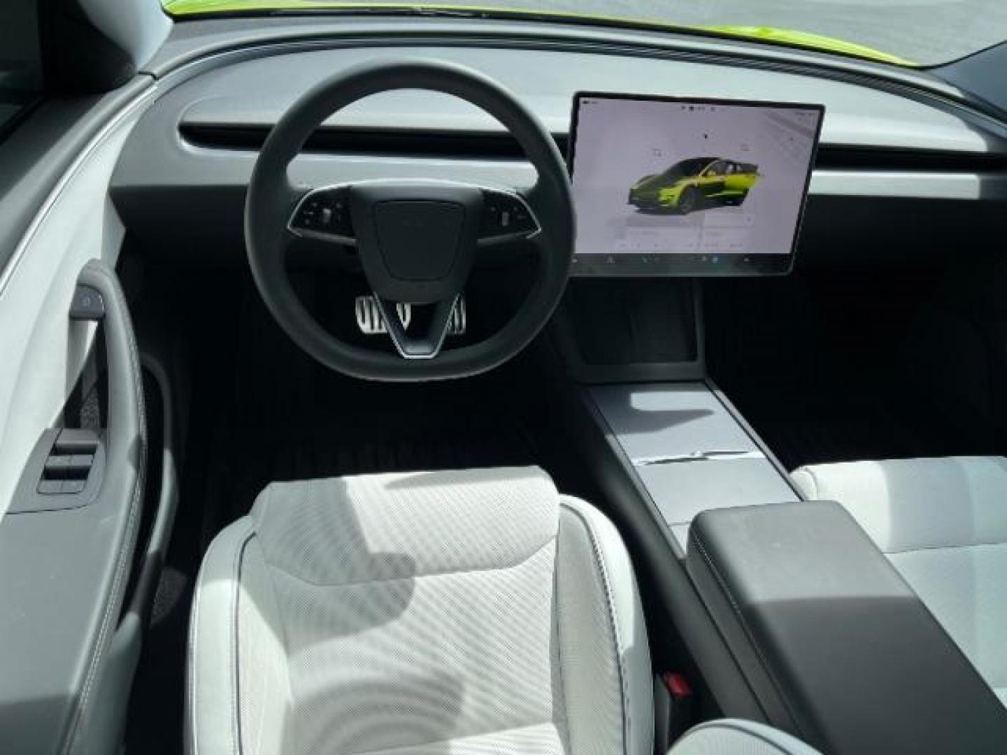 2024 Green /Black and White Tesla Model 3 Performance (5YJ3E1ET4RF) with an ELECTRIC engine, 1-Speed Automatic transmission, located at 1865 East Red Hills Pkwy, St. George, 84770, (435) 628-0023, 37.120850, -113.543640 - Green wrap! Experience the exhilarating performance of the near-new, redesigned 2024 Tesla Model 3 Performance. This high-performance sedan boasts 510 horsepower, accelerating from 0 to 60 mph in just 2.9 seconds, with a top speed of 163 mph. Equipped with adaptive suspension and track mode, it offe - Photo#8