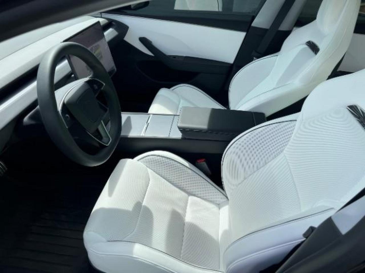 2024 Green /Black and White Tesla Model 3 Performance (5YJ3E1ET4RF) with an ELECTRIC engine, 1-Speed Automatic transmission, located at 1865 East Red Hills Pkwy, St. George, 84770, (435) 628-0023, 37.120850, -113.543640 - Green wrap! Experience the exhilarating performance of the near-new, redesigned 2024 Tesla Model 3 Performance. This high-performance sedan boasts 510 horsepower, accelerating from 0 to 60 mph in just 2.9 seconds, with a top speed of 163 mph. Equipped with adaptive suspension and track mode, it offe - Photo#9
