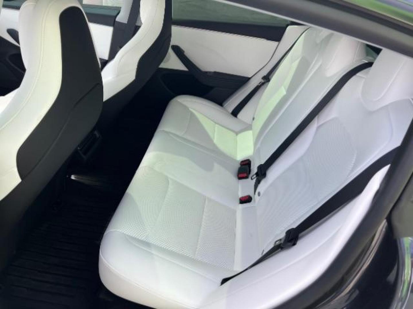2024 Green /Black and White Tesla Model 3 Performance (5YJ3E1ET4RF) with an ELECTRIC engine, 1-Speed Automatic transmission, located at 1865 East Red Hills Pkwy, St. George, 84770, (435) 628-0023, 37.120850, -113.543640 - Green wrap! Experience the exhilarating performance of the near-new, redesigned 2024 Tesla Model 3 Performance. This high-performance sedan boasts 510 horsepower, accelerating from 0 to 60 mph in just 2.9 seconds, with a top speed of 163 mph. Equipped with adaptive suspension and track mode, it offe - Photo#11