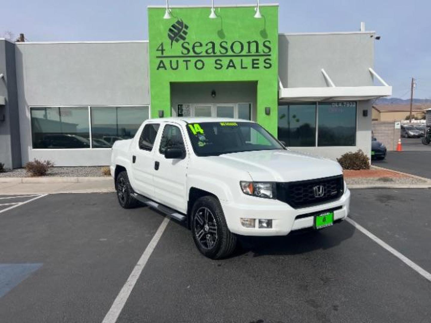 2014 White /Black Honda Ridgeline Sport (5FPYK1F75EB) with an 3.5L V6 SOHC 24V engine, 5-Speed Automatic transmission, located at 1865 East Red Hills Pkwy, St. George, 84770, (435) 628-0023, 37.120850, -113.543640 - We specialize in helping ALL people get the best financing available. No matter your credit score, good, bad or none we can get you an amazing rate. Had a bankruptcy, divorce, or repossessions? We give you the green light to get your credit back on the road. Low down and affordable payments that fit - Photo#0
