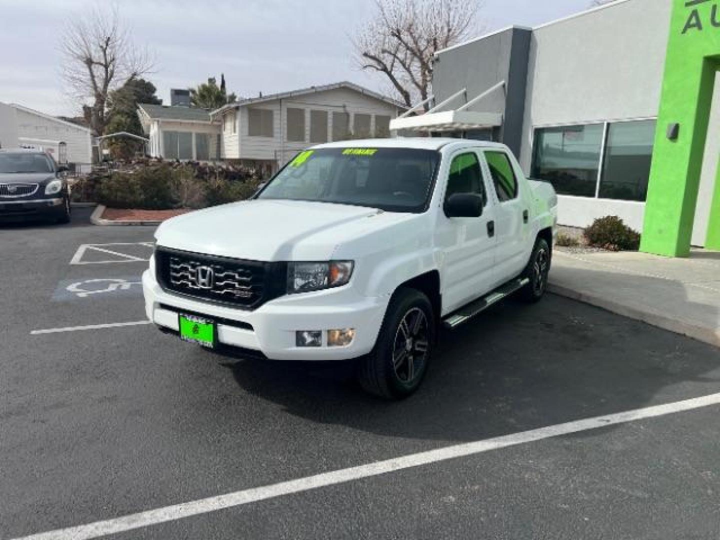 2014 White /Black Honda Ridgeline Sport (5FPYK1F75EB) with an 3.5L V6 SOHC 24V engine, 5-Speed Automatic transmission, located at 1865 East Red Hills Pkwy, St. George, 84770, (435) 628-0023, 37.120850, -113.543640 - We specialize in helping ALL people get the best financing available. No matter your credit score, good, bad or none we can get you an amazing rate. Had a bankruptcy, divorce, or repossessions? We give you the green light to get your credit back on the road. Low down and affordable payments that fit - Photo#2