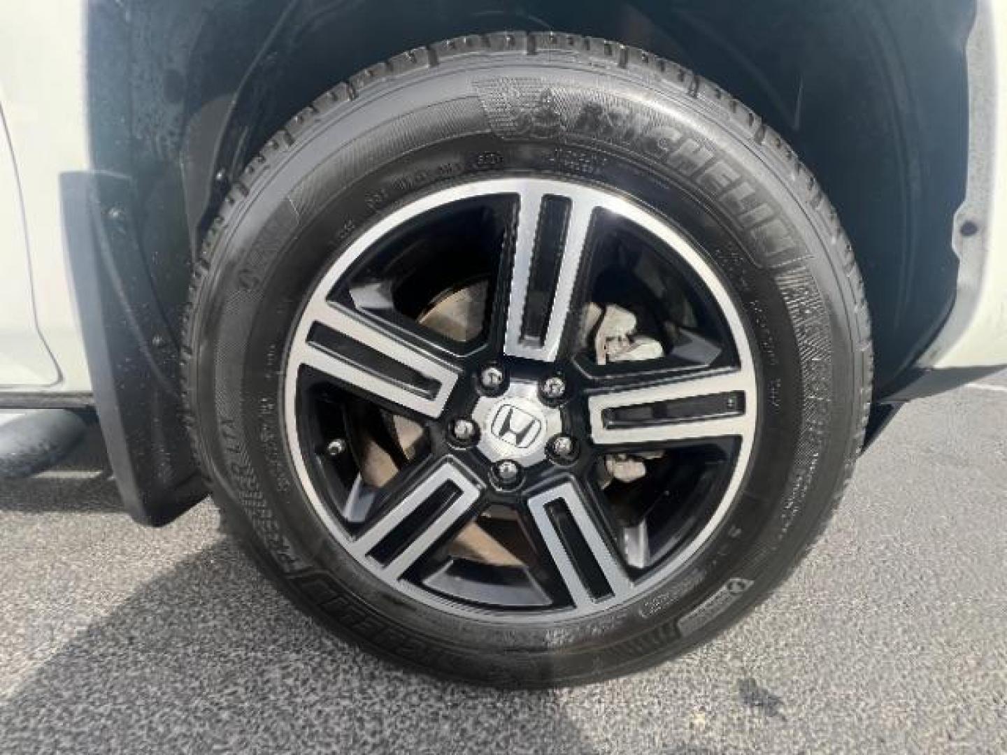 2014 White /Black Honda Ridgeline Sport (5FPYK1F75EB) with an 3.5L V6 SOHC 24V engine, 5-Speed Automatic transmission, located at 1865 East Red Hills Pkwy, St. George, 84770, (435) 628-0023, 37.120850, -113.543640 - We specialize in helping ALL people get the best financing available. No matter your credit score, good, bad or none we can get you an amazing rate. Had a bankruptcy, divorce, or repossessions? We give you the green light to get your credit back on the road. Low down and affordable payments that fit - Photo#9